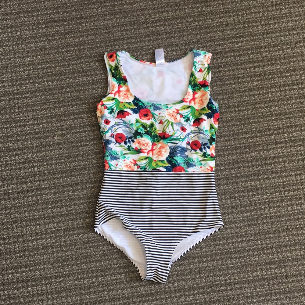 One piece swimsuit.